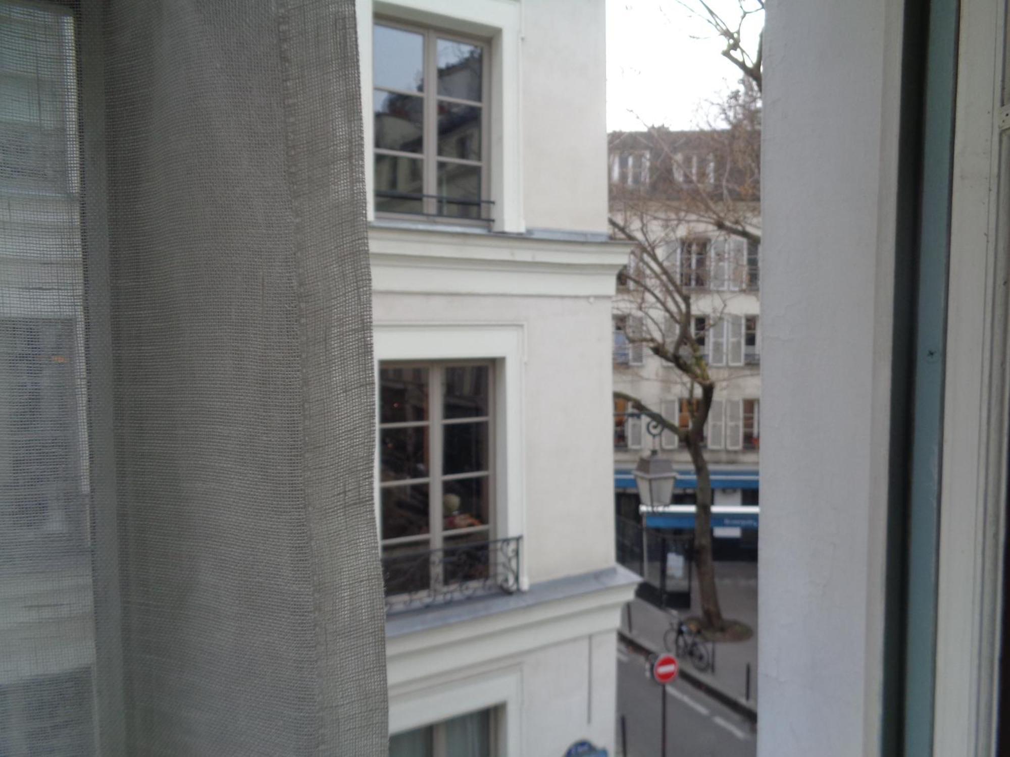 Hotel Les Degres De Notre Dame Paris Exterior foto